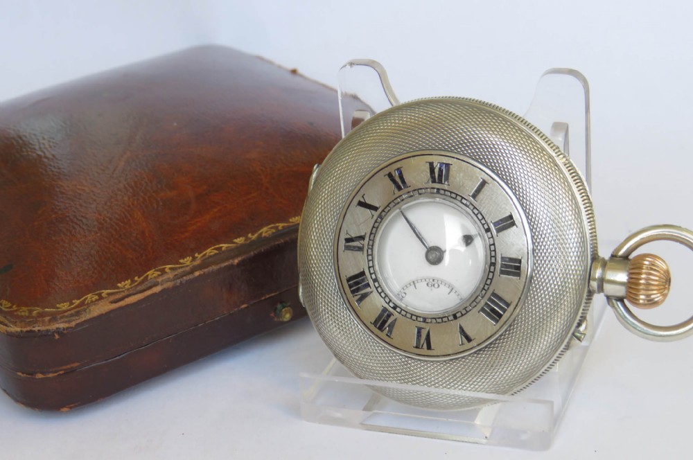 Silver half hunter Longines pocket watch for J W Benson