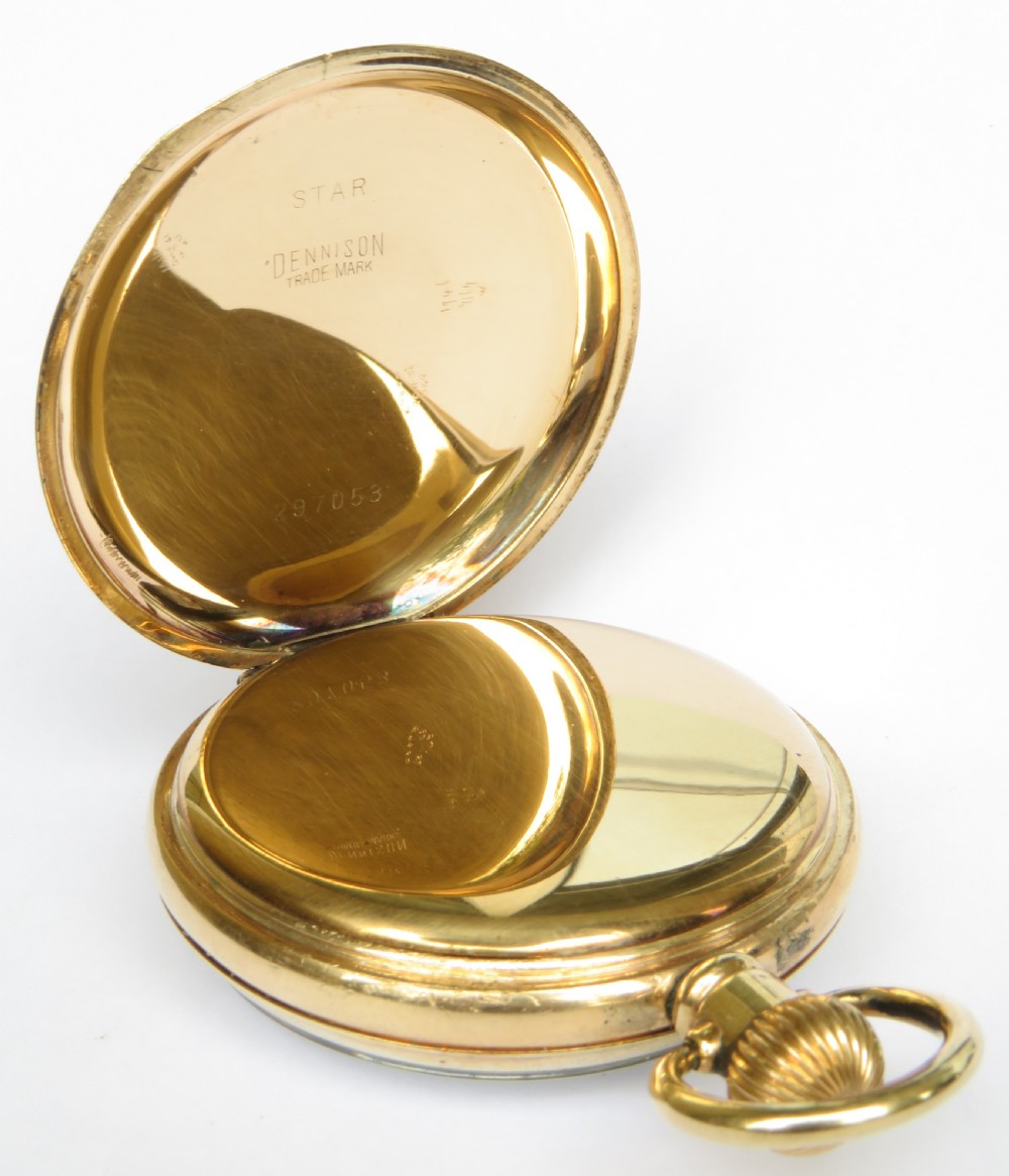 A 1930s gold-toned open-face pocket watch displaying a white dial with black Arabic numerals and a sub-seconds dial at six oclock. View III