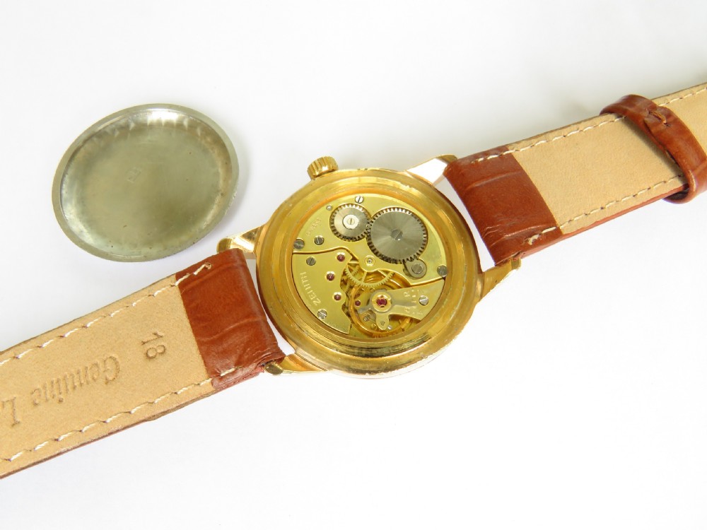 A vintage 1960s Zenith Stellina mechanical wristwatch featuring a gold-plated case, champagne sub-seconds dial, and a brown crocodile-grain leather strap. View III