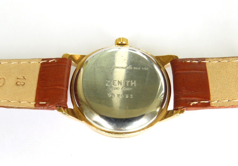 A vintage 1960s Zenith Stellina mechanical wristwatch featuring a gold-plated case, champagne sub-seconds dial, and a brown crocodile-grain leather strap. View IV