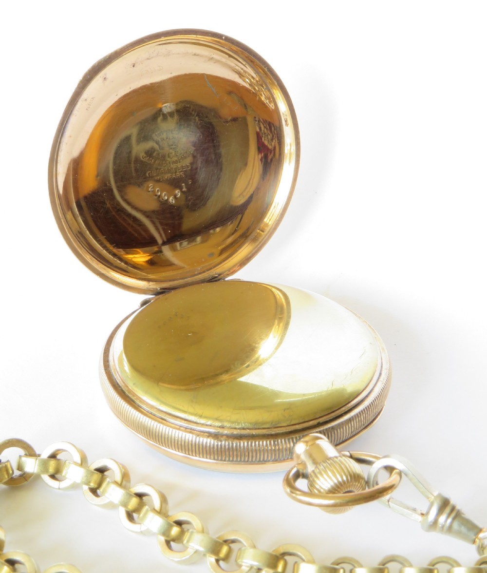 A 1930s gold-tone open-face pocket watch with a white dial, Roman numerals, a sub-seconds dial, and a linked Albert chain with a T-bar. View III