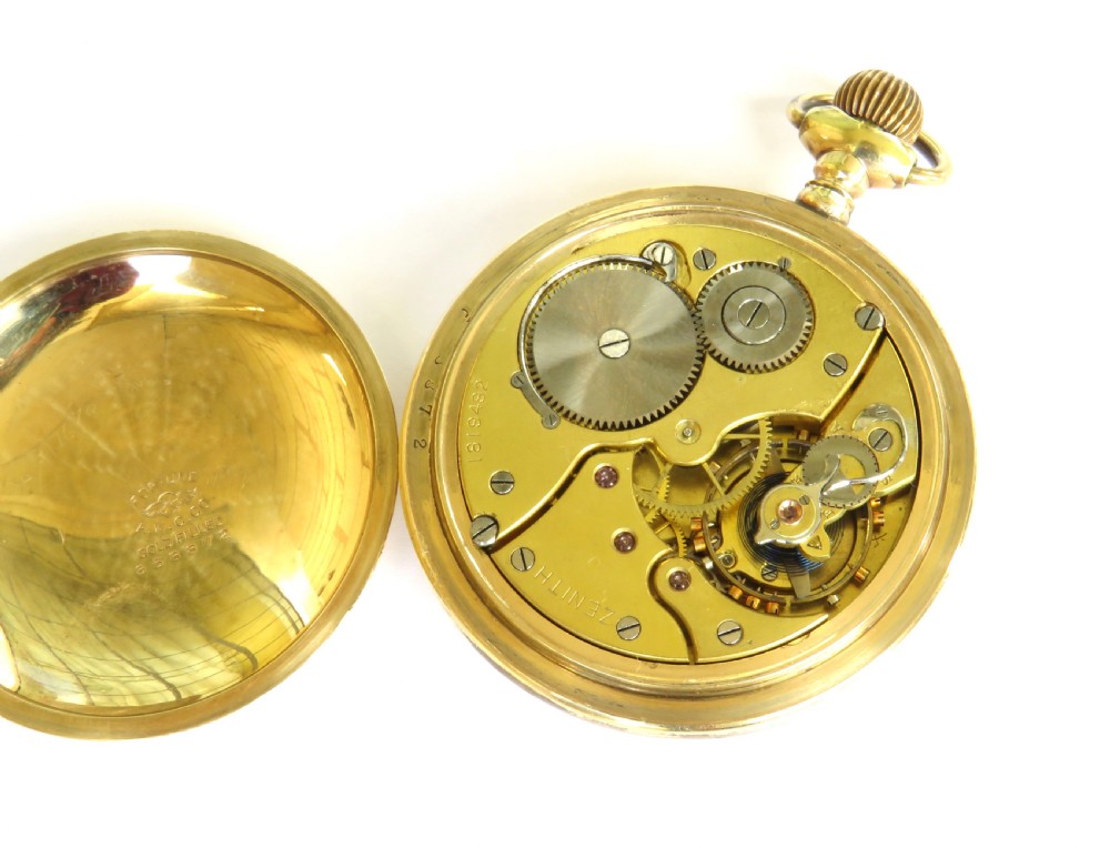 An open-face antique gold-tone pocket watch featuring a white enamel dial, black Arabic hour numerals, red 24-hour markings, and a subsidiary seconds sub-dial. View III