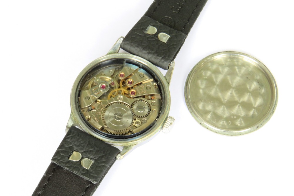 A 1940s Roamer gents wristwatch featuring a round black dial with Arabic numerals, a sub-second dial at six oclock, a chrome-plated case, and a textured black leather strap. View II