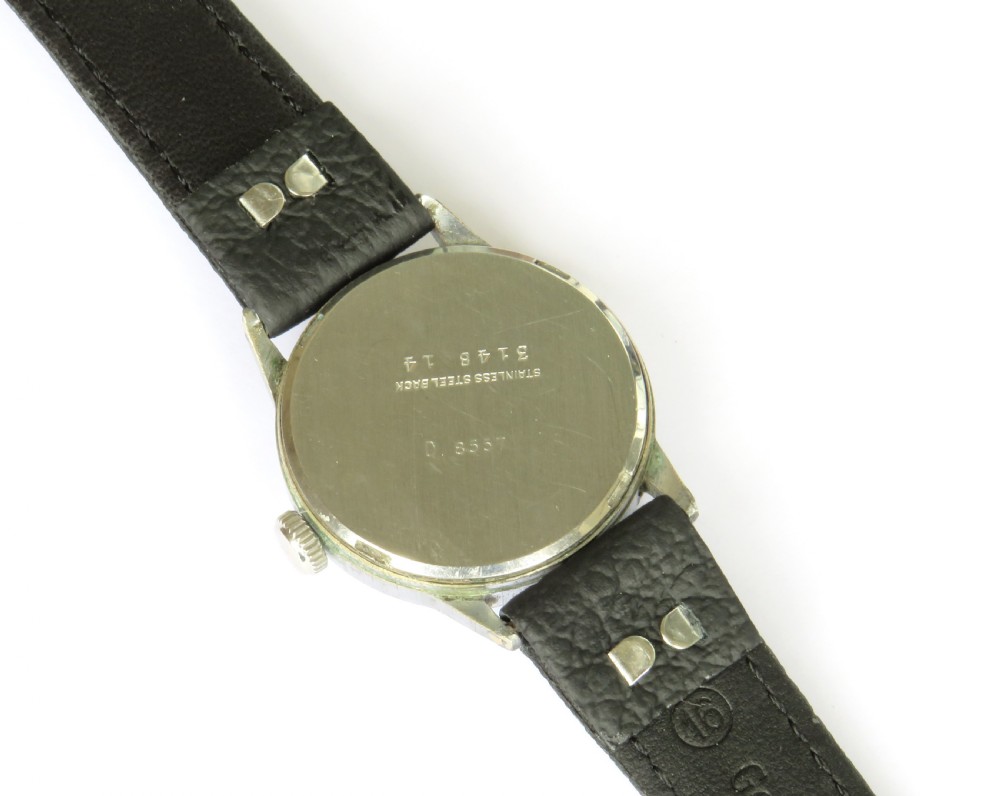 A 1940s Roamer gents wristwatch featuring a round black dial with Arabic numerals, a sub-second dial at six oclock, a chrome-plated case, and a textured black leather strap. View III