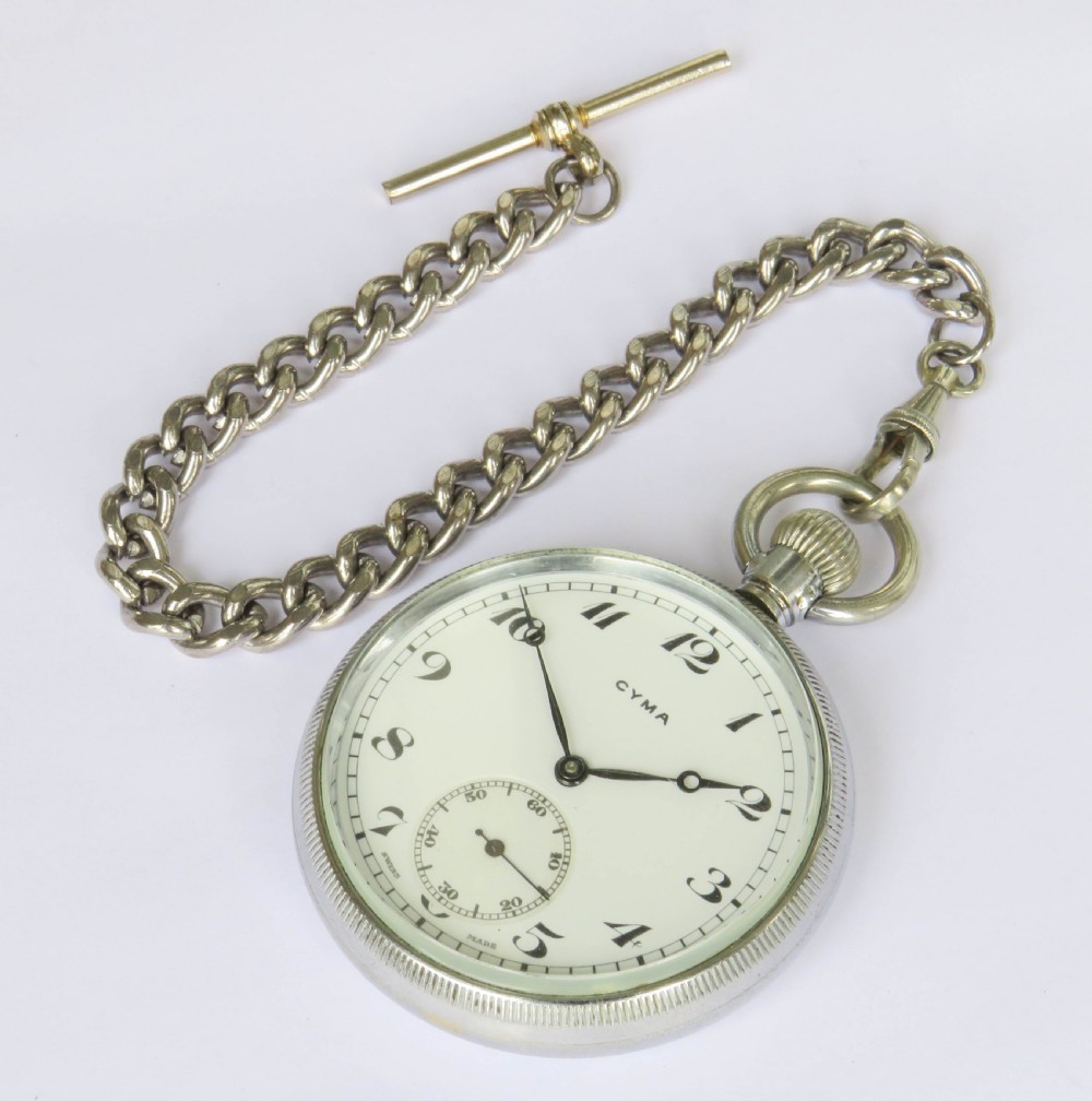 A 1930s Cyma open-face pocket watch featuring a white dial, black Arabic numerals, a sub-seconds dial, and a silver-toned curb chain with a T-bar. View II