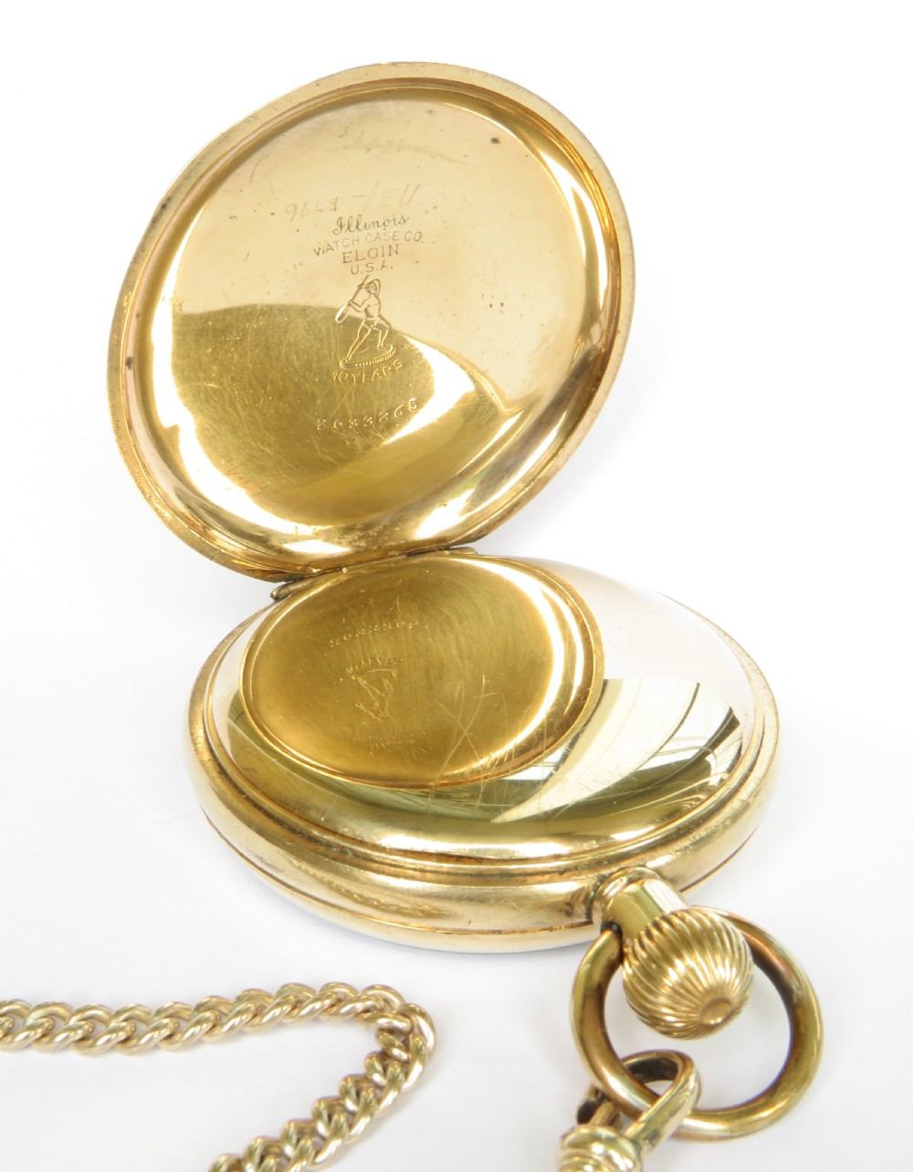 A 1930s Swiss open-faced pocket watch featuring a white enamel dial with black Roman numerals, a subsidiary seconds dial, and a matching gold-toned curb chain with a T-bar. View II