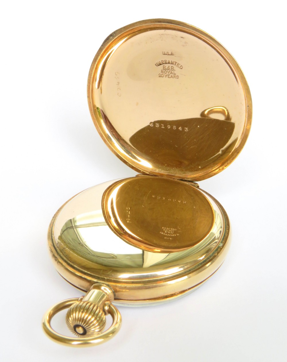 An open-face gold Waltham Traveler pocket watch featuring a white enamel dial with black Roman numerals and a subsidiary seconds dial. View IV
