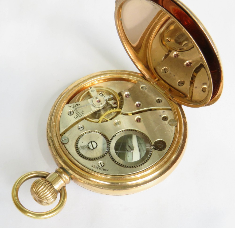 A gold-toned open-face pocket watch featuring a white enamel dial with black Roman numerals and a subsidiary seconds dial. View V