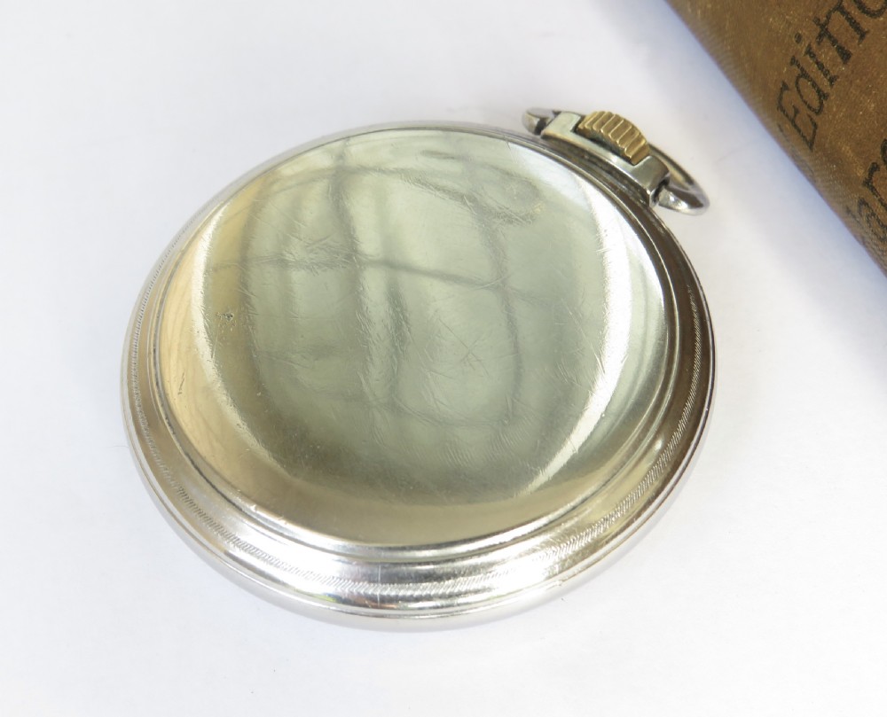 A vintage Hamilton open-face pocket watch featuring a white dial, bold black Arabic numerals, a sub-seconds dial, and a gold-tone crown. View IV