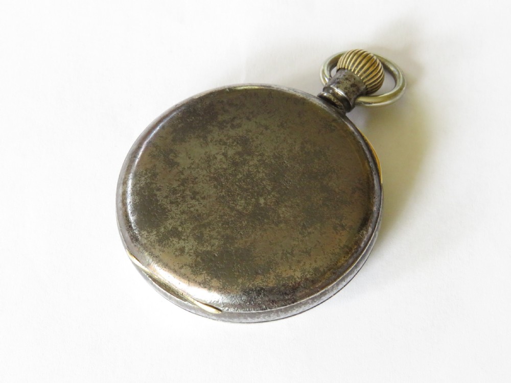 An open-face 1915 Waltham pocket watch featuring a white enamel dial with black Roman numerals, a sub-seconds dial, and a brass winding crown. View V