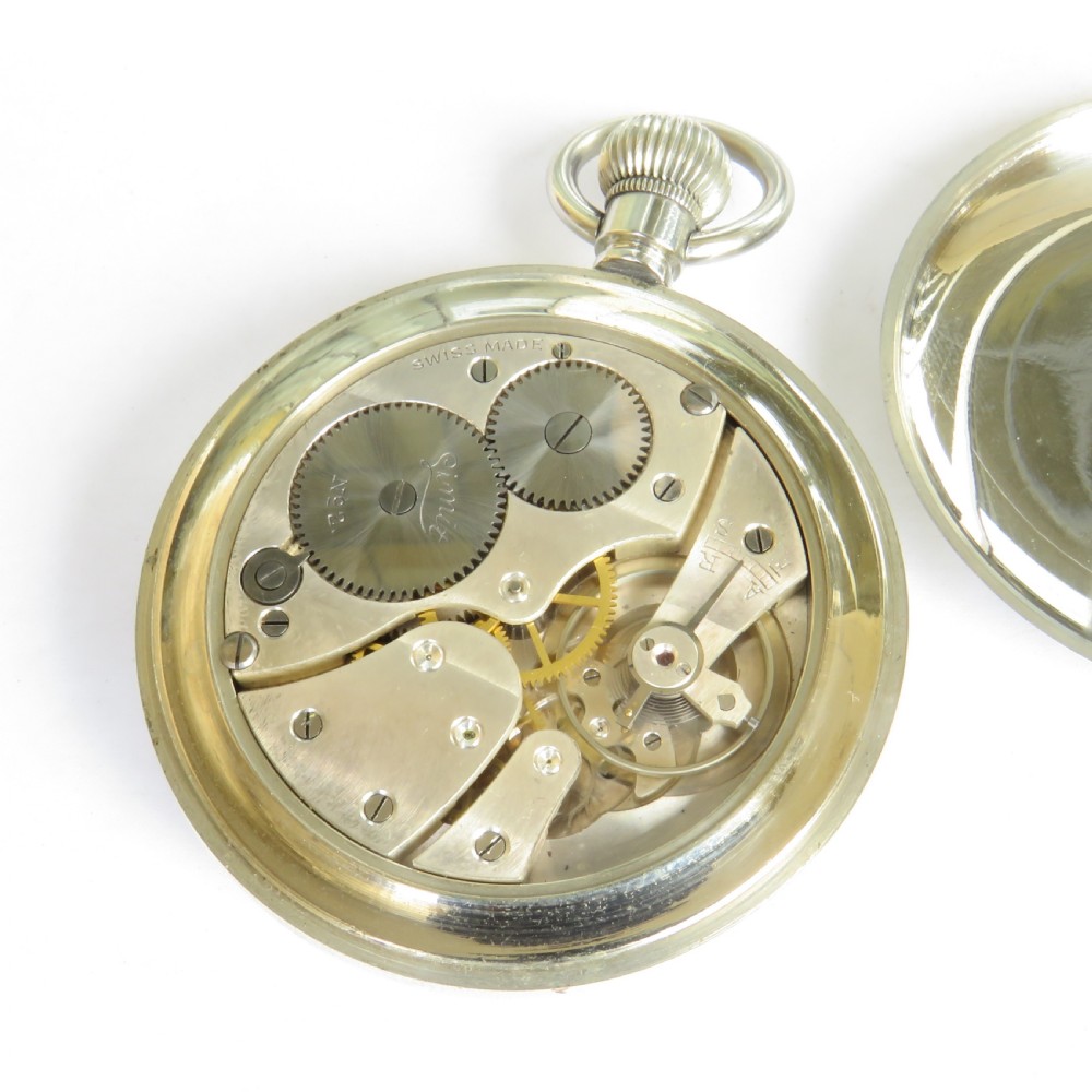 An open-face 1920s silver pocket watch featuring a white enamel dial with black Roman numerals and a subsidiary seconds sub-dial. View III