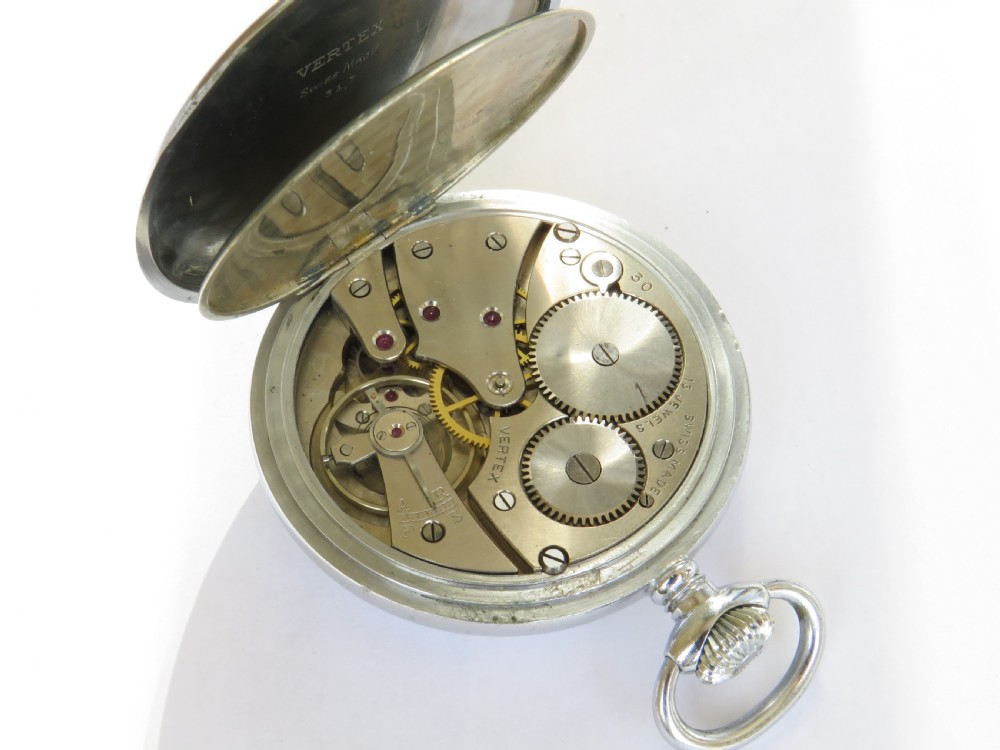 A 1940s silver-toned open-face pocket watch featuring a white enamel dial signed J W Benson London with black Arabic numerals and a subsidiary seconds dial. View V