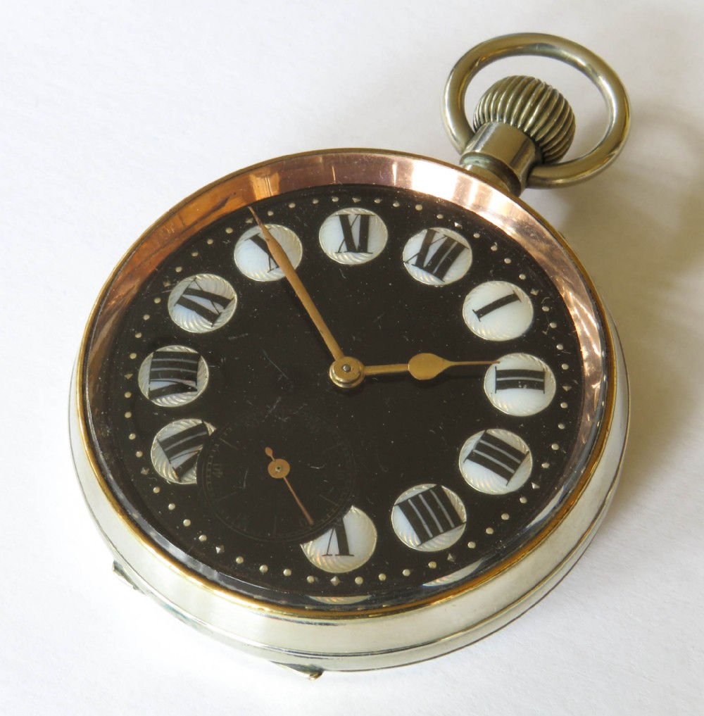 An antique Edwardian Goliath pocket watch featuring a black dial with circular mother-of-pearl cartouche hour markers, Roman numerals, and a gold-tone bezel ring.