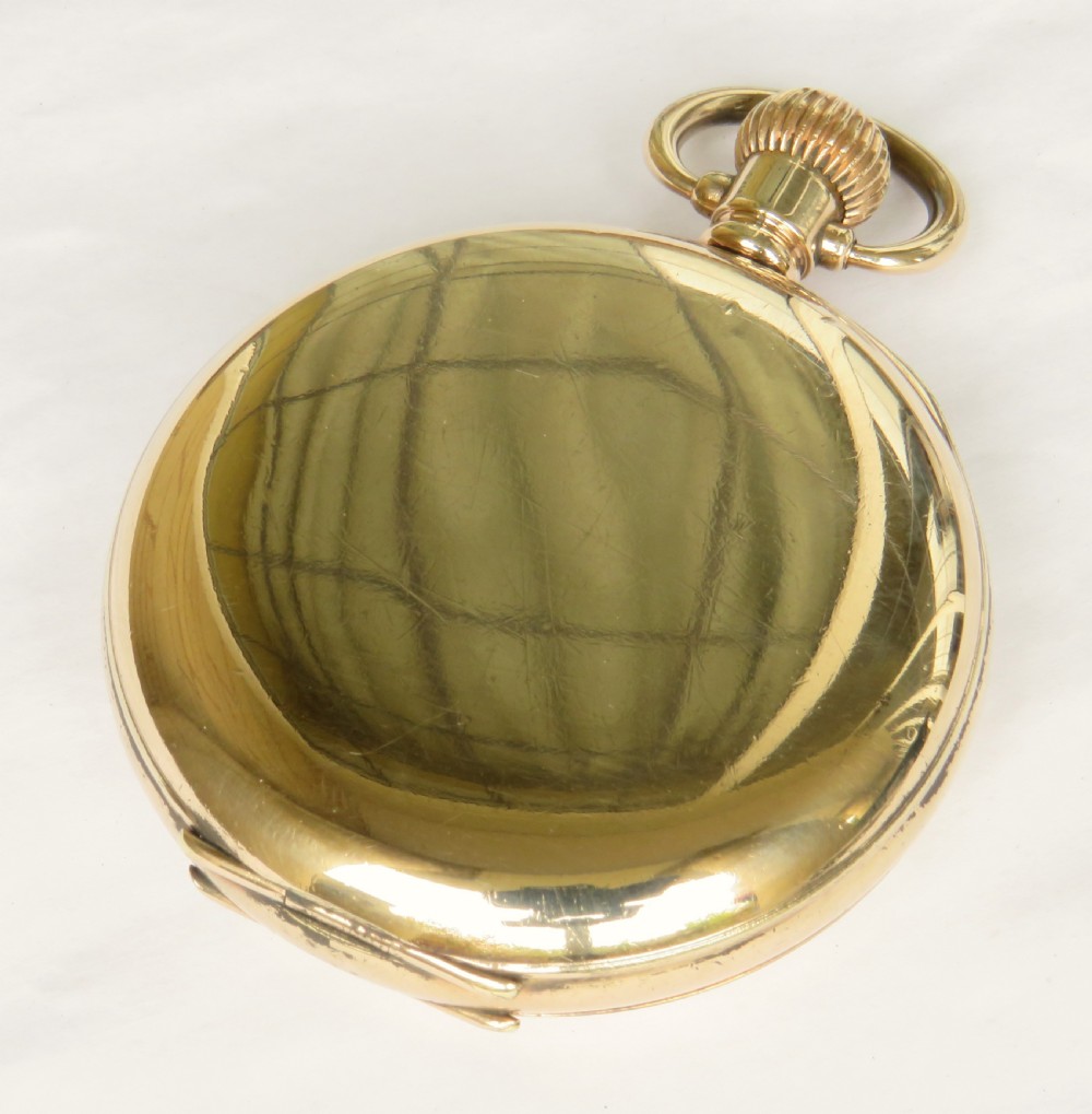 An open gold full hunter pocket watch displaying a white enamel dial with black Roman numerals and a small seconds subdial. View IV