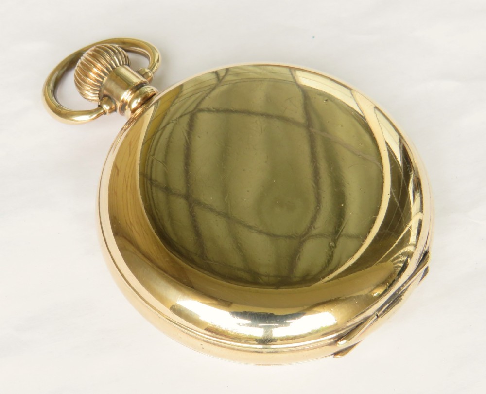 An open gold full hunter pocket watch displaying a white enamel dial with black Roman numerals and a small seconds subdial. View V