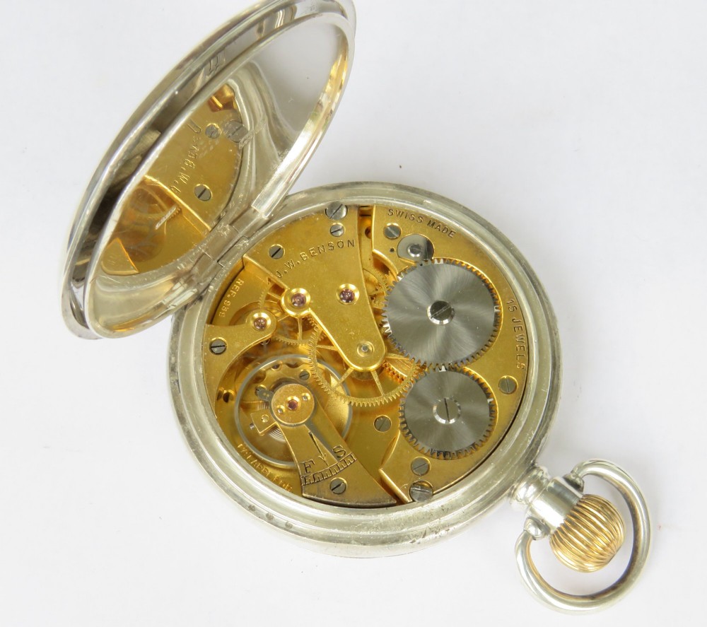 An antique open-face silver pocket watch featuring a white enamel dial with black Roman numerals and a subsidiary seconds dial. View IV