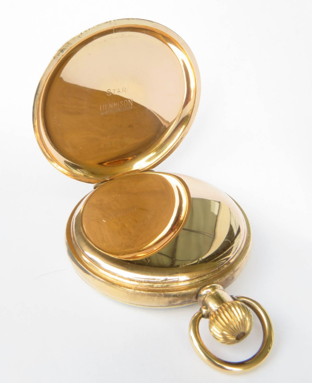 A gold-toned open-face Waltham pocket watch featuring a white enamel dial with black Roman numerals and a sub-seconds dial. View III