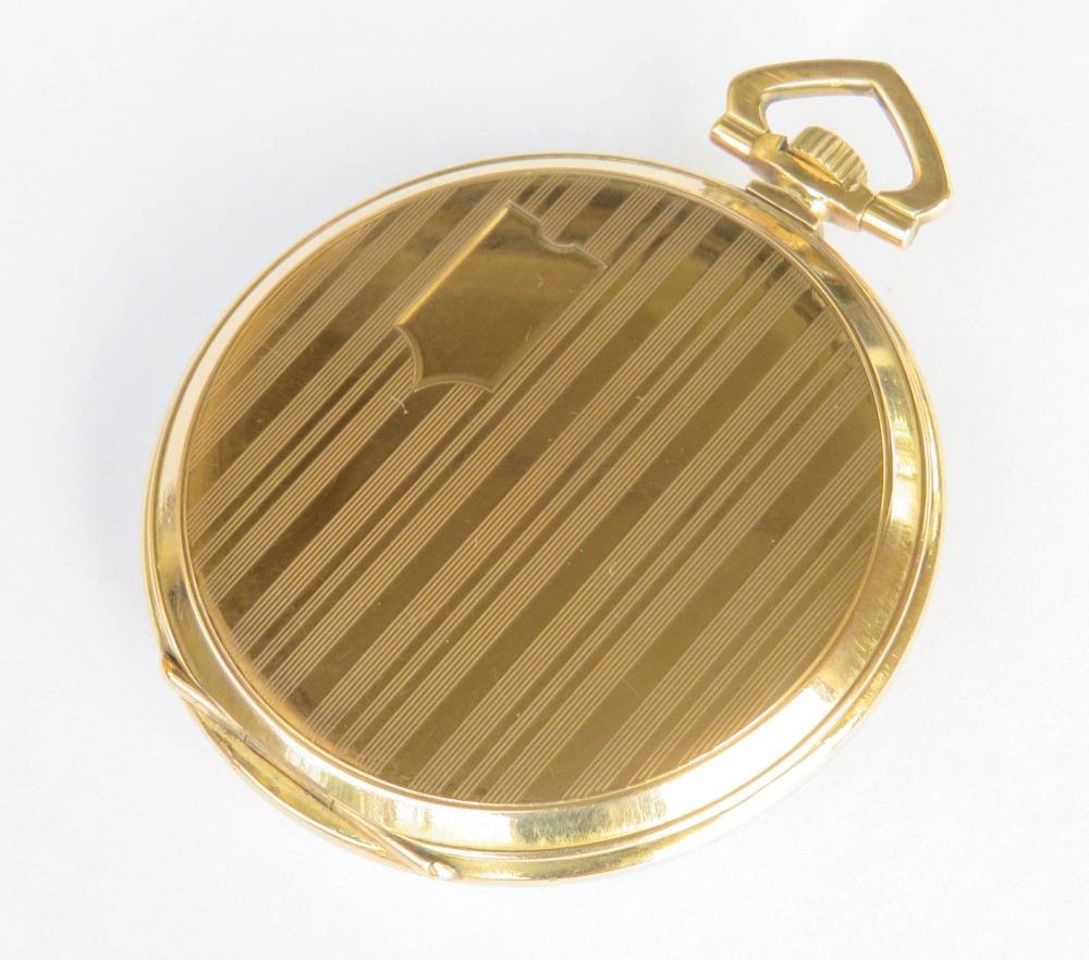 An open-face Art Deco pocket watch featuring a gold case, champagne dial with stylized Arabic numerals, sub-seconds dial, and geometric top bow. View V