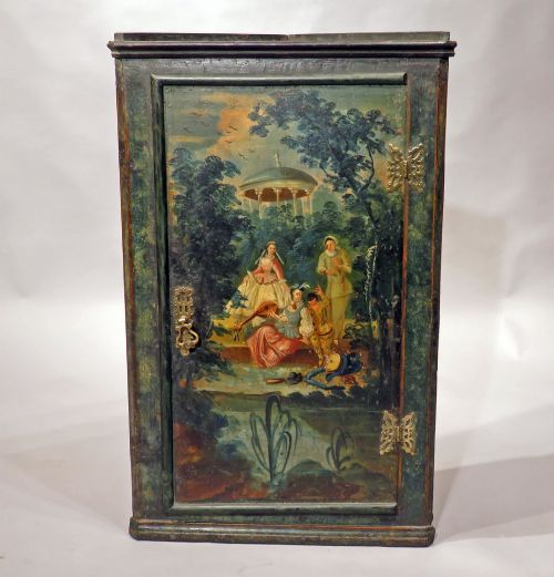 AN EARLY 18TH CENTURY PAINTED HANGING CORNER CUPBOARD