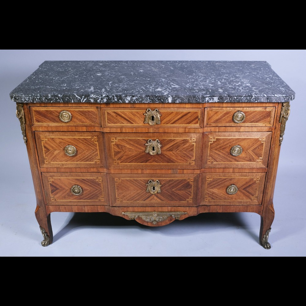 An 18th-century French Louis XVI walnut parquetry commode featuring three drawers with gilt bronze hardware and a grey marble top surface. View III