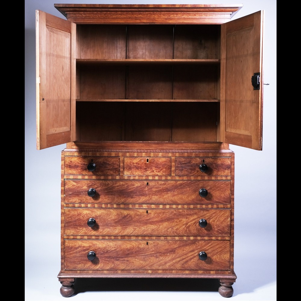A 19th-century scumble-painted housekeepers cupboard with two upper cupboard doors and four lower drawers with black turned knobs. View II