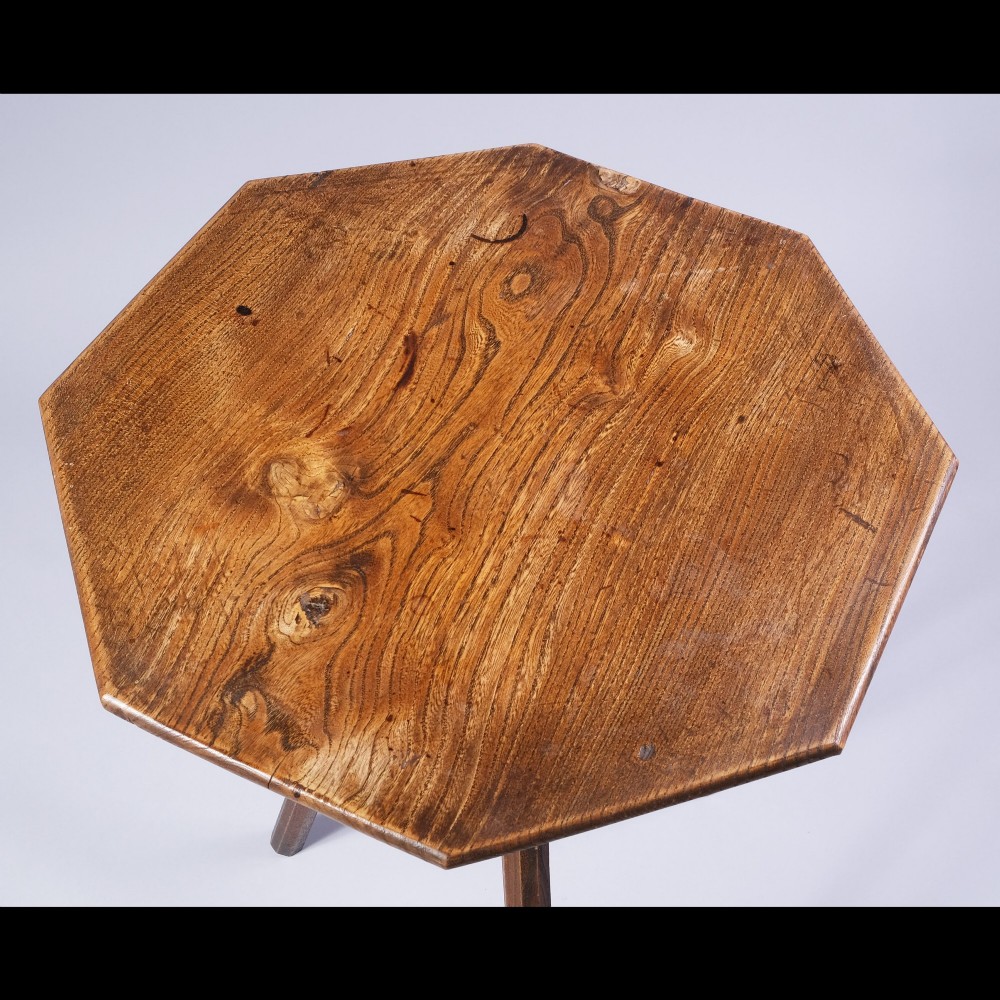 An early 19th-century ash wood side table featuring an octagonal top supported by three straight splayed legs. View IV