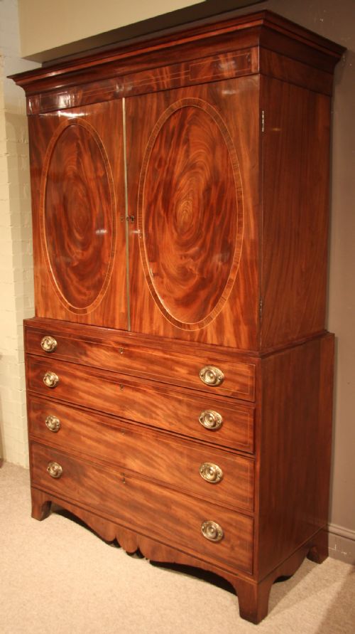 fig 1. Superb Quality George III Channel Islands Flame Mahogany Linen Press, Circa 1800