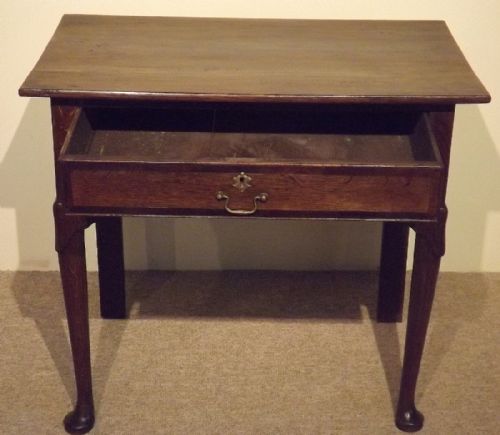 fig 1. A Mid 18th century Oak Lowboy on Pad Feet c1750