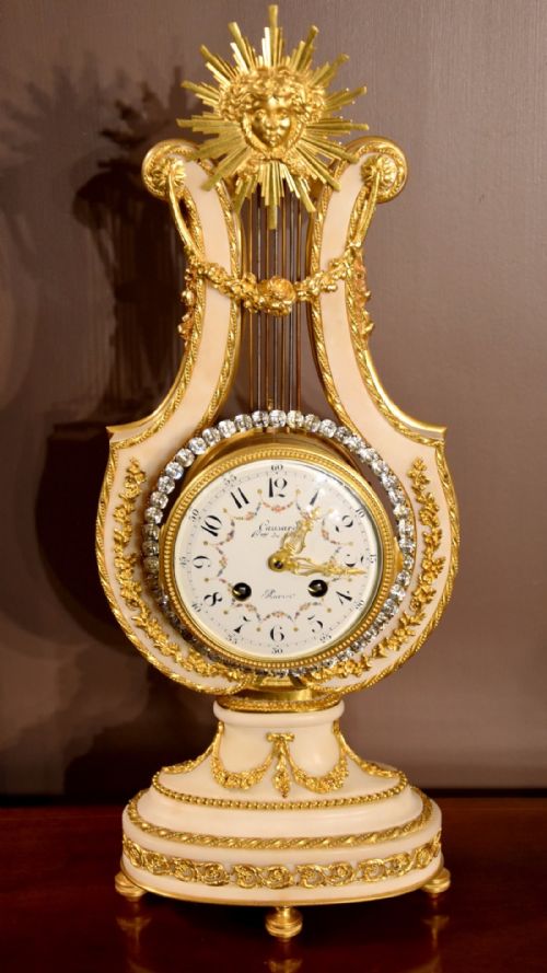 A Good French White Marble and Ormolu Mantel Clock