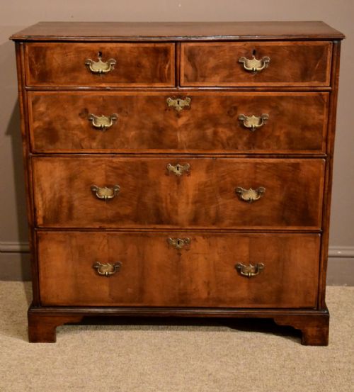 An Extremely Unusual Narrow George I Walnut Chest of Drawers