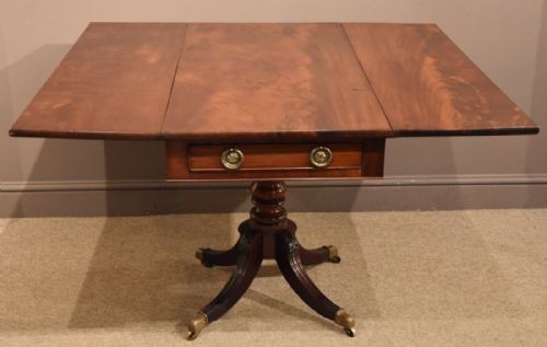 An Elegant Regency Period Mahogany Pembroke Table with Flamed Timber