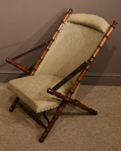A Good Late 19century Oak Campaign Armchair
