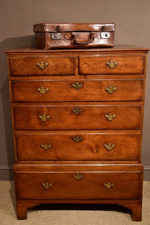 fig 1. An Attractive George II Oak Chest on Stool with Walnut Cross-Banding
