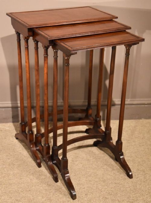 An Elegant Set of Three Late 19th Century Mahogany Nest of Tables

