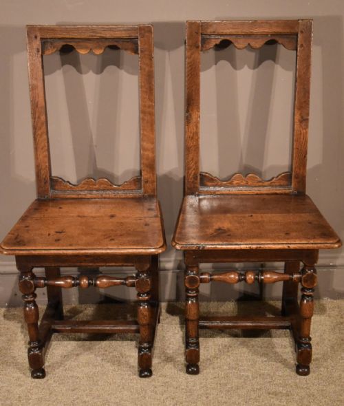 A Good Pair of Early 18th Century Oak and Fruitwood Back Stools