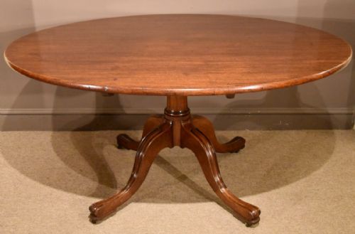 A Superb Large Late George III Mahogany Oval Breakfast Table