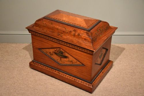 A Superb Regency Satinwood and Birds Eye Maple Cellarette