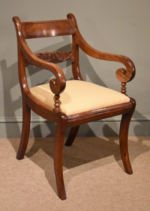 An Elegant Regency Mahogany Armchair with Brass Inlay
