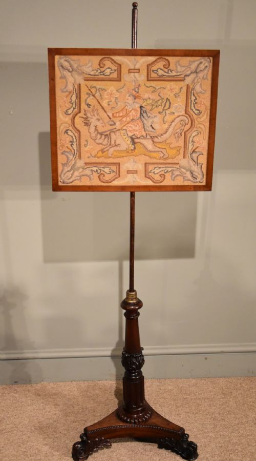 A Regency Carved Pole Screen