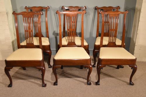 A Superb Set of Six George III Walnut Dining Chairs