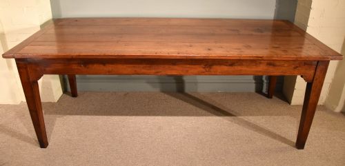 A Mid 19th Century French Cherry Wood Farmhouse Table