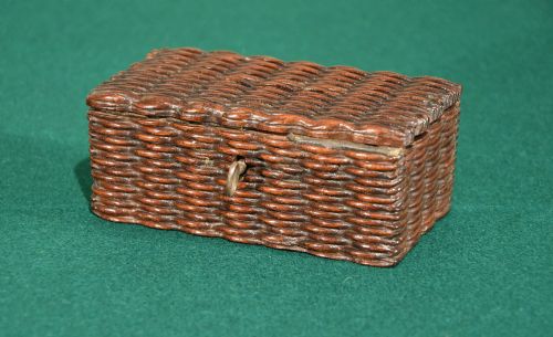 An Early 19th Century Basket Weave Carved Been Money Box