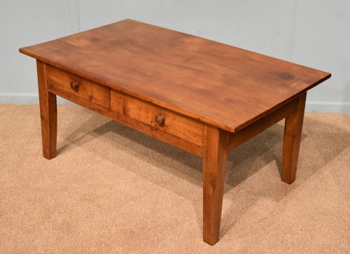 An Attractive French Breton mid Nineteenth Century Cherry Wood Coffee Table