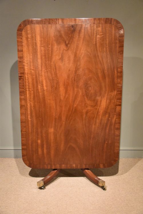 A Regency Breakfast Table with Mahogany & Ebony Banding