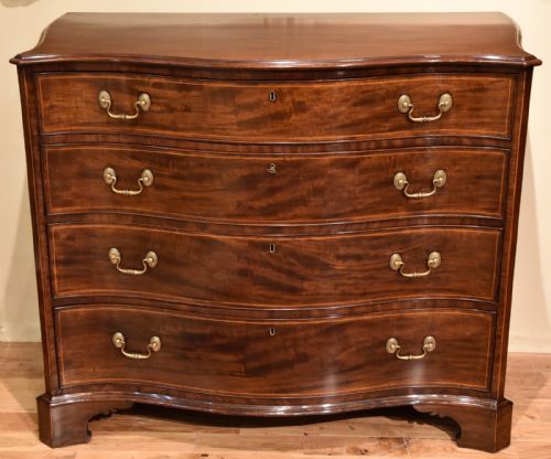 A Handsome 18th Century Mahogany and Boxwood Serpentine Chest of Drawers