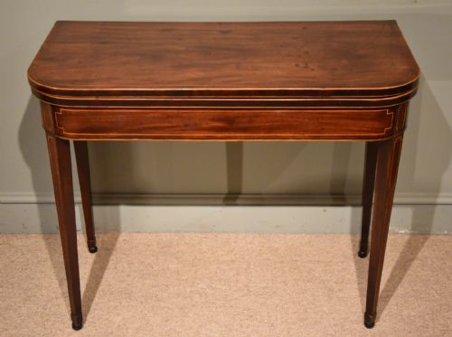 A George III Flame Mahogany Tea Table