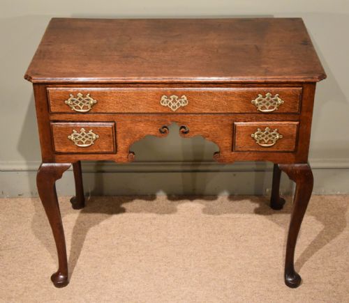 A George III Oak Lowboy