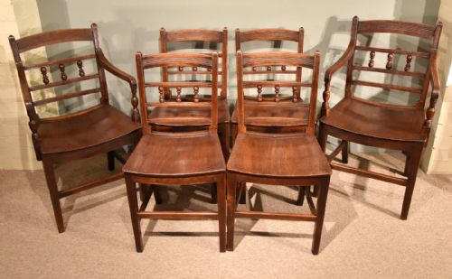 A Set of Six Cherry Wood Country Dining Chairs