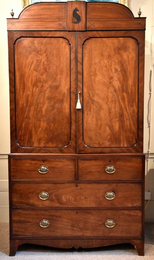 A George III Mahogany Linen Press with Rare Fox Motif