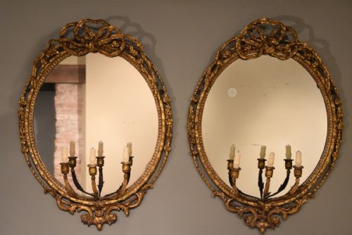 A Pair of 19th Century Oval Gilt Gesso Girandole Mirrors